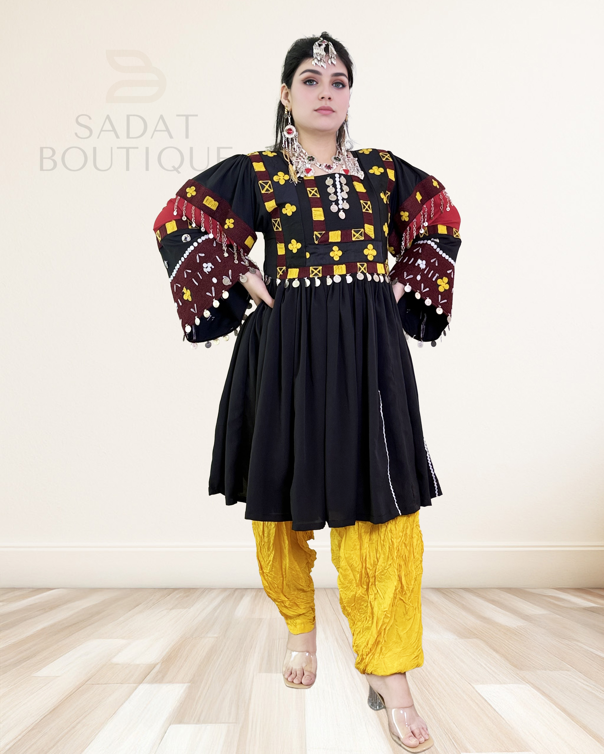black afghani dress Elevate your style with our black dress featuring an elegant #Afghanistan flag embroidery. Proudly display your heritage with this unique fashion statement. Embrace culture and fashion in one stunning piece! Mahal